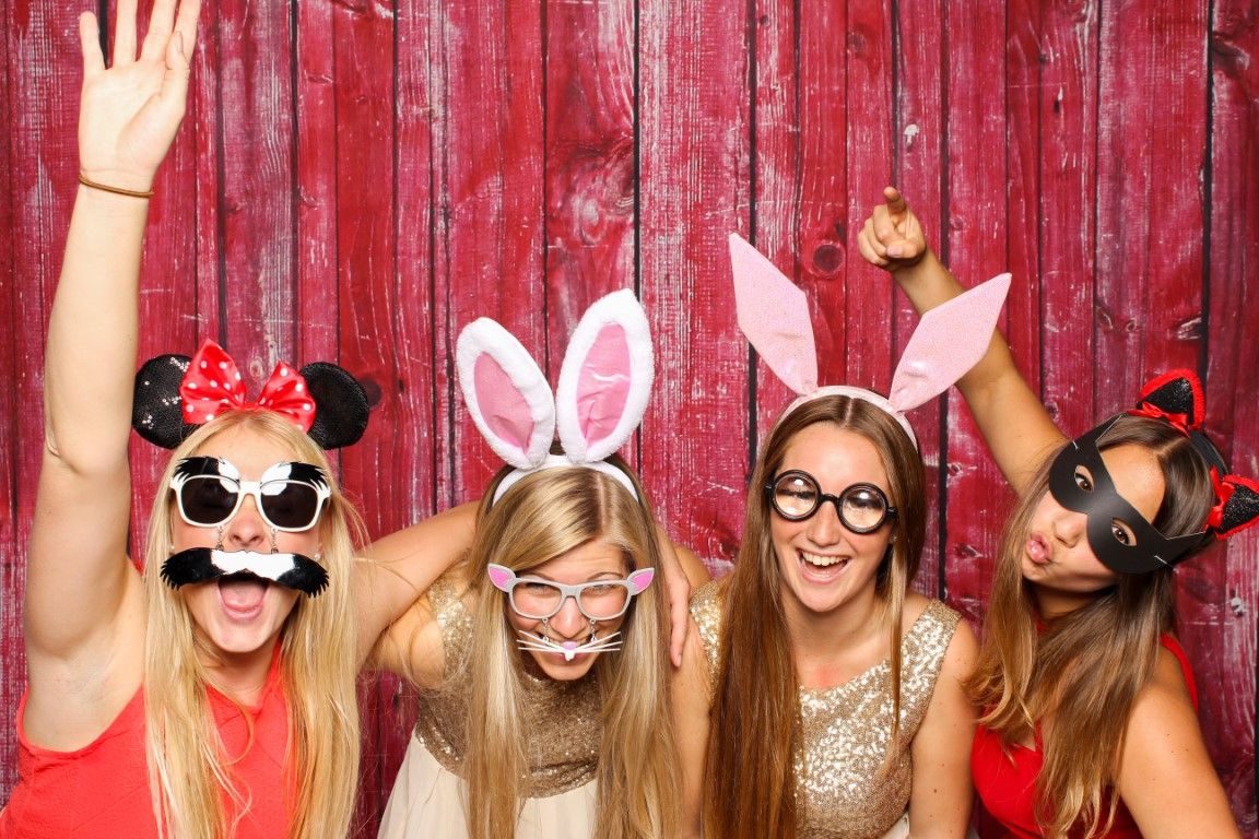 Guests captured mid-motion by a GIF booth at a Danbury party